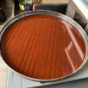 Vintage Formica 14” Serving Tray w/ Metal wrapped exterior w 3 feet. 
POOS